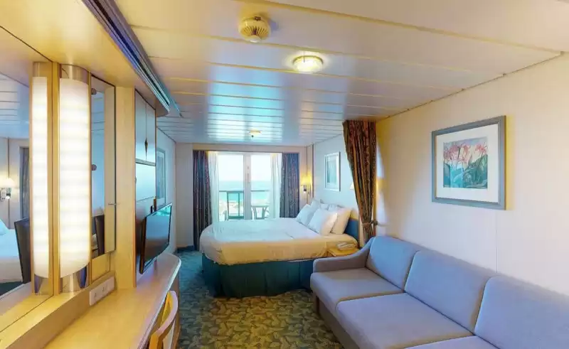 Cabina espaciosa con vista al mar y balcón