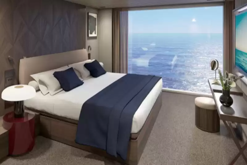Suite orientada a proa con dormitorio principal y balcón grande